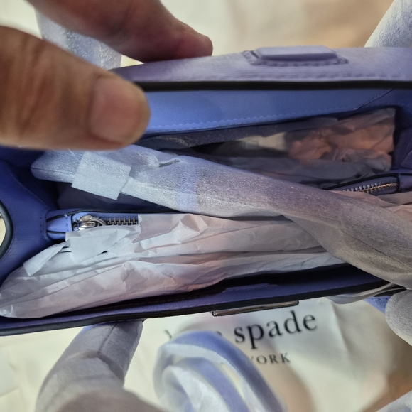 Kate Spade New York

Genie Blue Sam Icon Square Tote - Picture 14 of 14